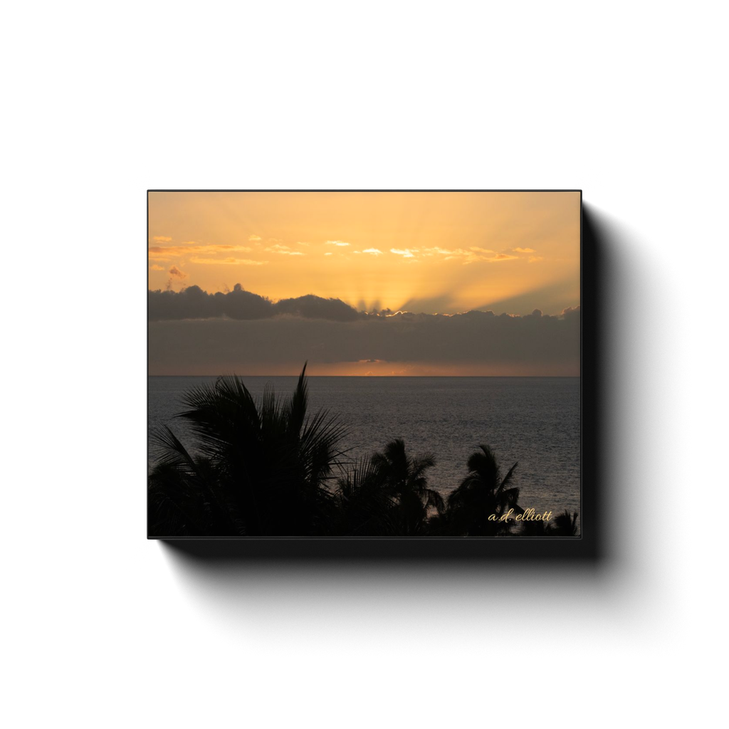 Gallery-wrapped canvas featuring a golden sunset over the Pacific Ocean and silhouetted palm trees at Wailea Beach in Maui, photographed by a.d. elliott.