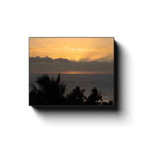 Gallery-wrapped canvas featuring a golden sunset over the Pacific Ocean and silhouetted palm trees at Wailea Beach in Maui, photographed by a.d. elliott.