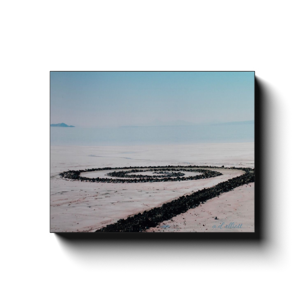 Gallery-wrapped canvas featuring Spiral Jetty, the iconic land art installation by Robert Smithson at Utah's Great Salt Lake.