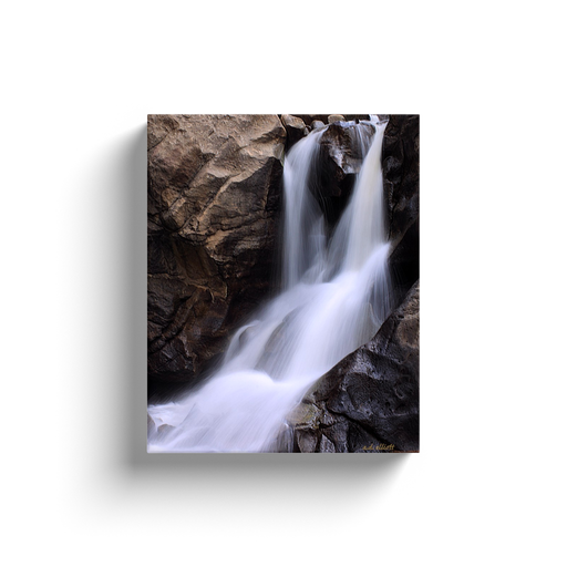 A long exposure photograph of Boulder Falls, found in Boulder Canyon Colorado.  Printed on high quality, artist-grade stock and folded around a lightweight frame to give them a gorgeous, gallery-ready appearance. With acid-free ink that will last without fading or chipping, Features a scratch-resistant UV coating. Wipes clean easily with a damp cloth or to remove dust, vacuum gently using a soft brush attachment.