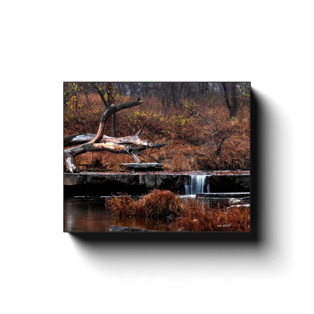 A long exposure photograph of Sand Creek in Osage Hills State Park Oklahoma. Taken by the photographer a.d. elliott - Take the Back Roads - #TaketheBackRoads  Printed on high quality, artist-grade stock and folded around a lightweight frame to give them a gorgeous, gallery-ready appearance. With acid-free ink that will last without fading or chipping, Features a scratch-resistant UV coating. Wipes clean easily with a damp cloth or to remove dust, vacuum gently using a soft brush attachment.