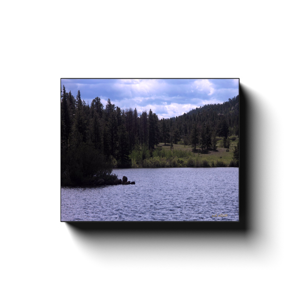 A photograph of Parvin Lake Colorado, taken by the photographer a.d. elliott  Printed on high quality, artist grade stock and folded around a lightweight frame to give them a gorgeous, gallery ready appearance. With acid free ink that will last without fading or chipping, Features a scratch-resistant UV coating. Wipes clean easily with a damp cloth or to remove dust, vacuum gently using a soft brush attachment.